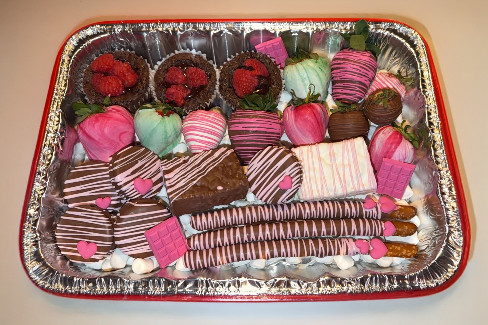 Chocolate-covered strawberry and treat platter